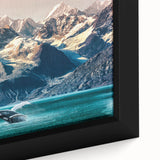 Close-up of a textured black wall art featuring vibrant Alaskan scenery on a framed canvas, suitable for a large living room.