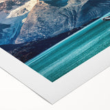 Art deco poster of Alaska scenery in muted blue tones on rolled canvas, suitable for dining room wall art.