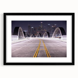 Extra large abstract art print of Los Angeles skyline in vibrant colors on a textured canvas, framed in black.
