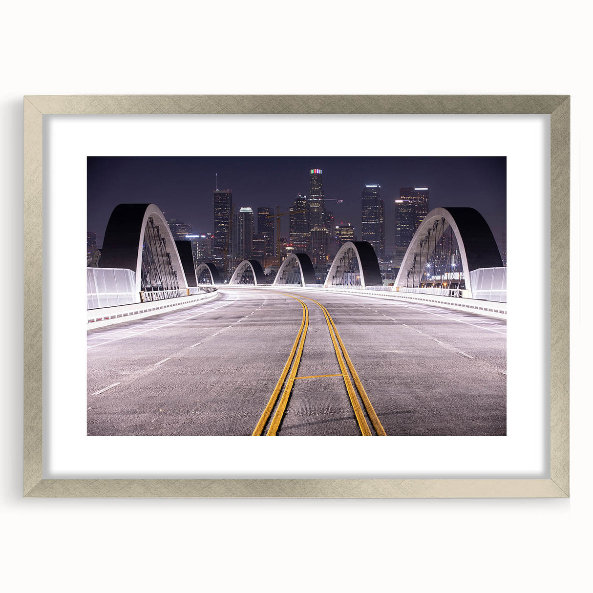 Textured abstract art print of Los Angeles skyline in muted gray and blue tones, framed in silver.