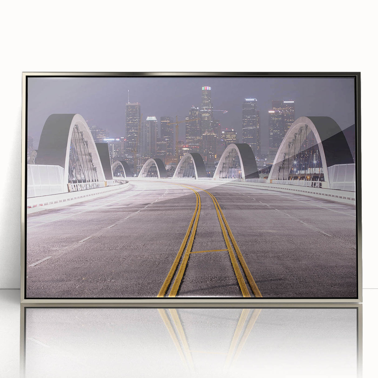 Mid-century modernist art of Los Angeles skyline in silver-framed acrylic, featuring pastel hues.