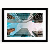 Extra large abstract art print of San Francisco skyline in vibrant, colorful hues on a framed black mat.