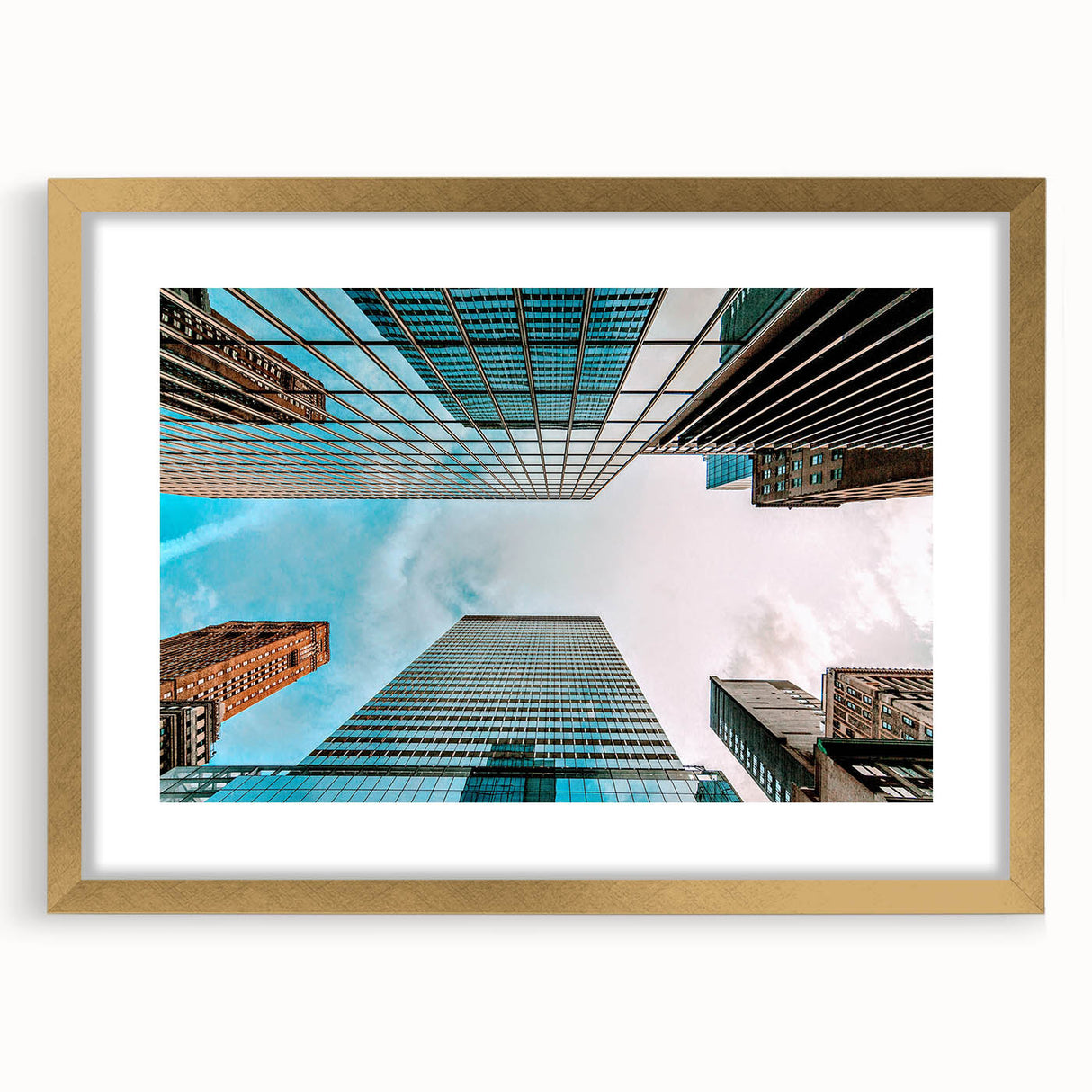 Extra large abstract art print of San Francisco skyline in textured dark and light blue shades on a gold-framed canvas.
