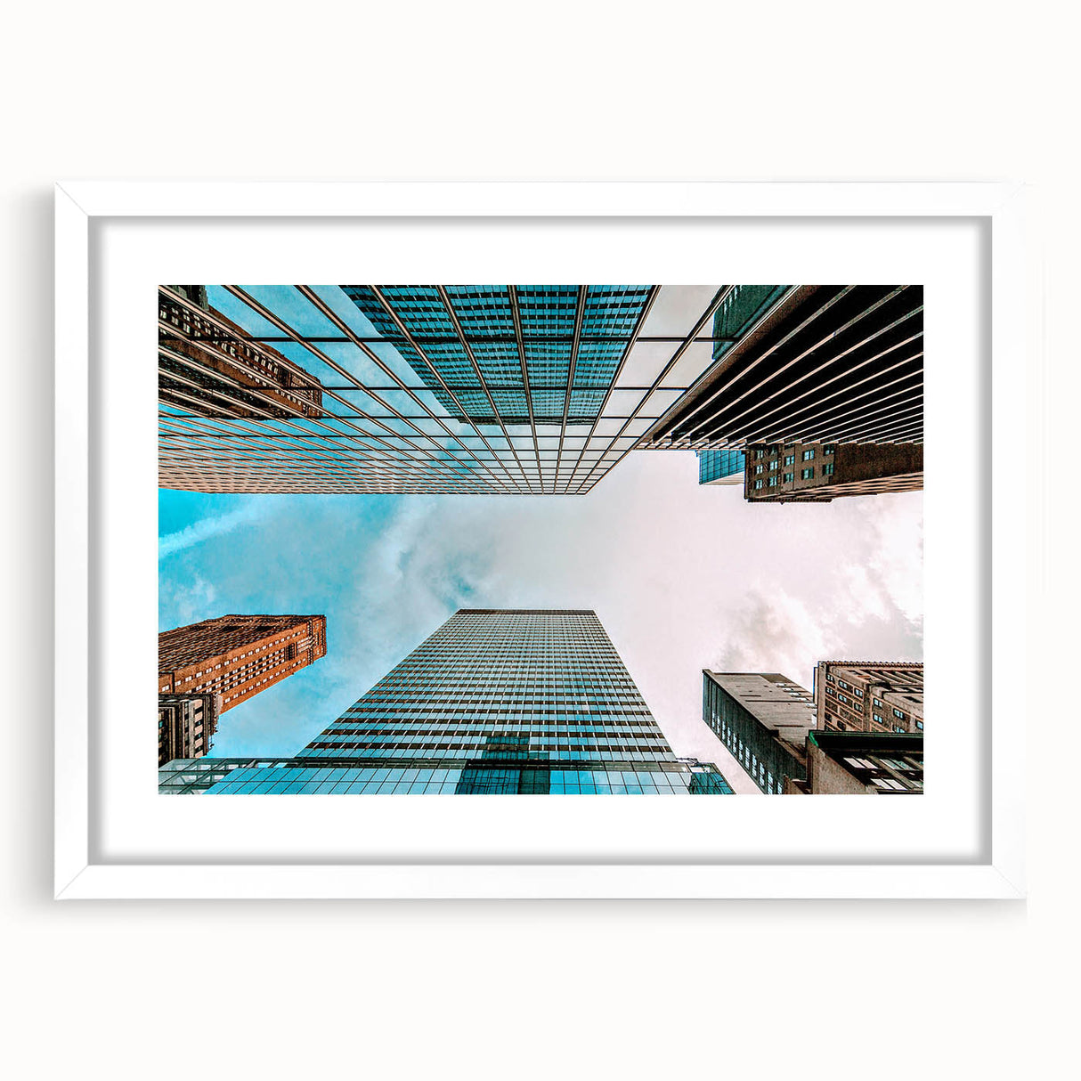 Abstract art print of San Francisco skyline in muted blue and gray tones on a framed white mat, ideal for dining room decor.