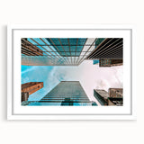Abstract art print of San Francisco skyline in muted blue and gray tones on a framed white mat, ideal for dining room decor.
