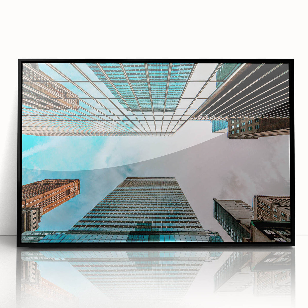 Large abstract wall art of San Francisco skyline in muted gray, framed in black acrylic.