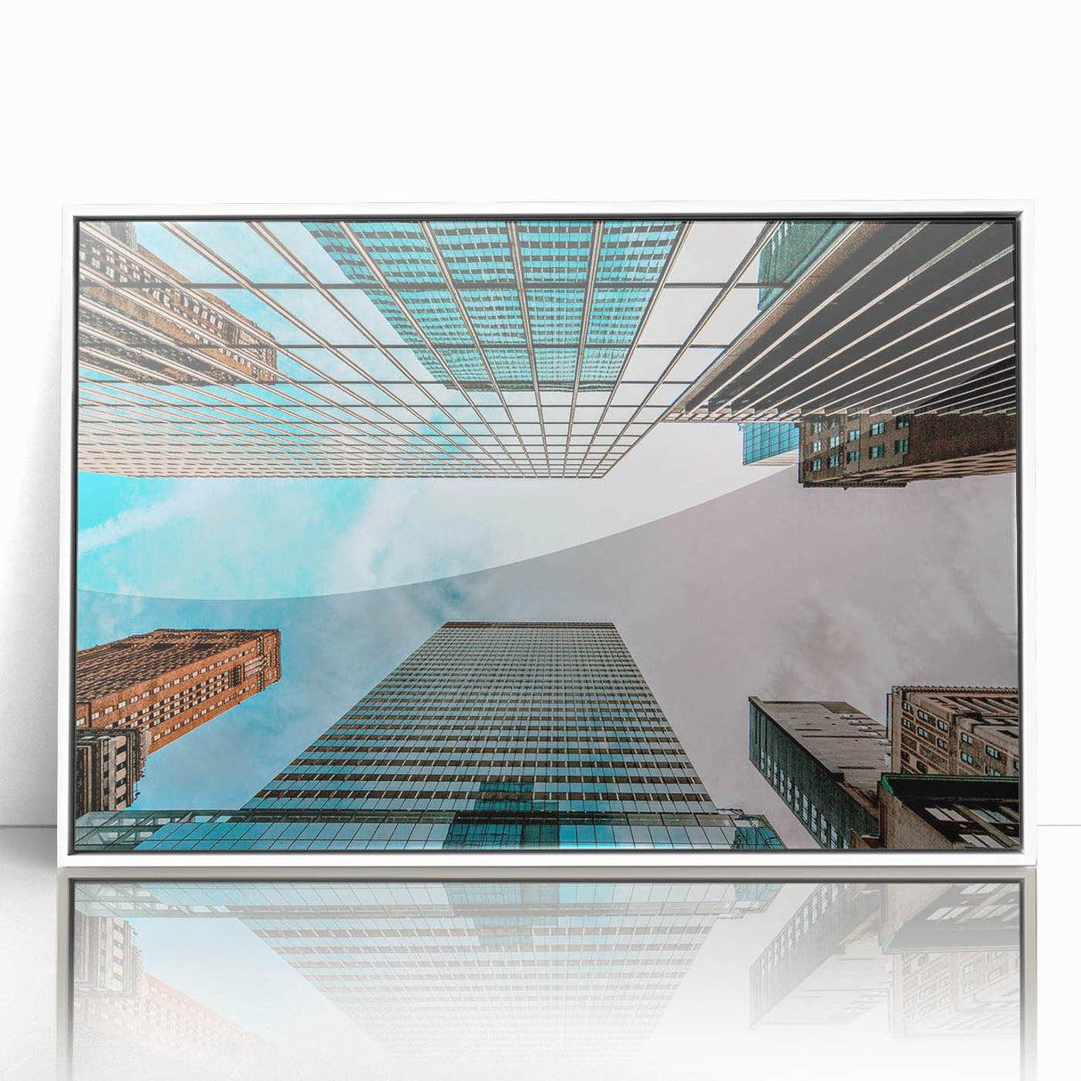 Art deco poster of San Francisco skyline in muted gray tones on framed acrylic.