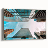 Framed canvas of San Francisco landscape art painting in silver, featuring vintage poster-style black and colorful elements.