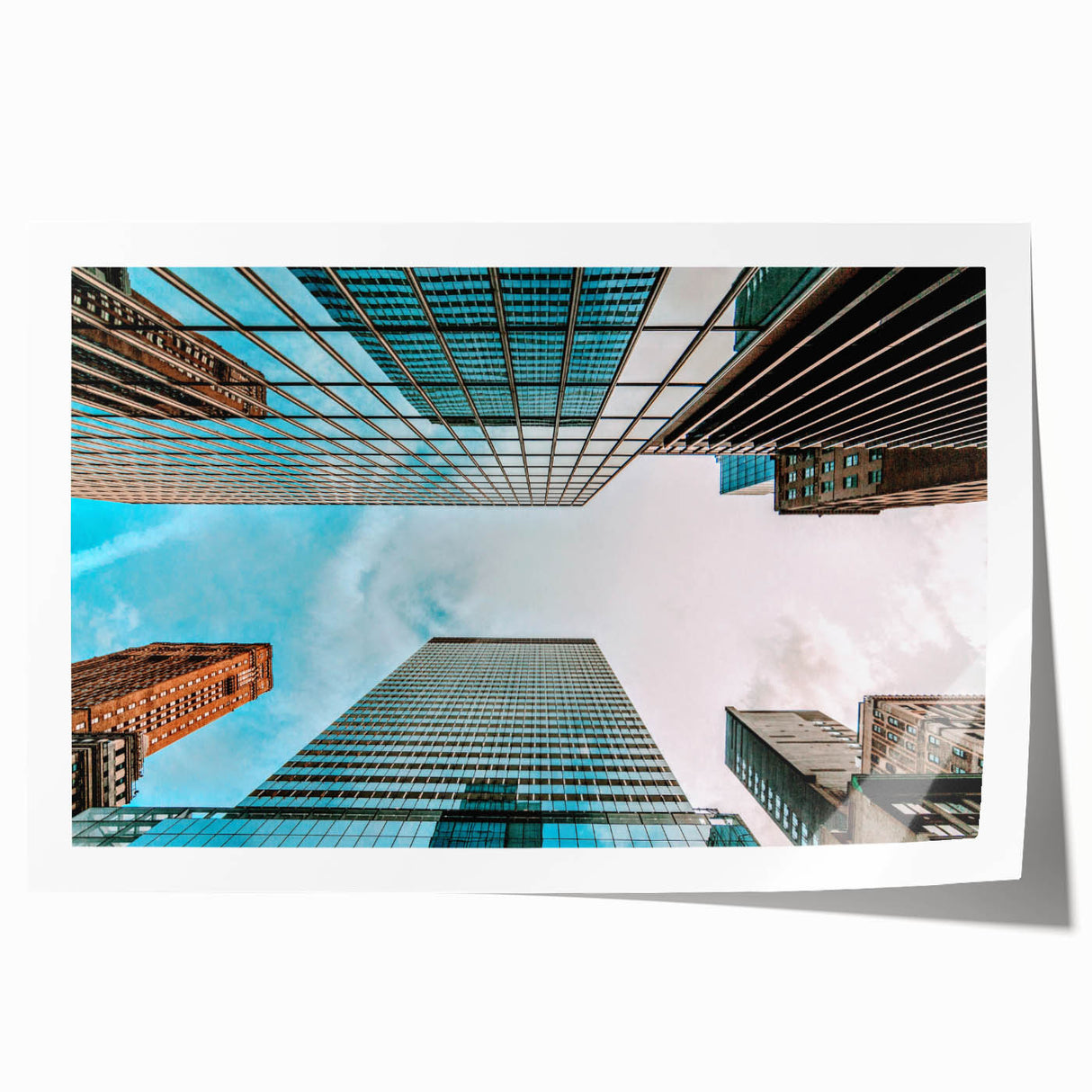Rolled print of San Francisco skyline in muted blue and gray tones, suitable for art wall dining room.