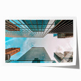 Rolled print of San Francisco skyline in muted blue and gray tones, suitable for art wall dining room.