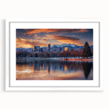 Abstract art print of Denver skyline in muted gray and blue tones on a framed white mat, ideal for dining room decor.
