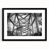 Abstract art print featuring vibrant, colorful scenery of Delaware in a black frame with a mat, ideal for living room decor.