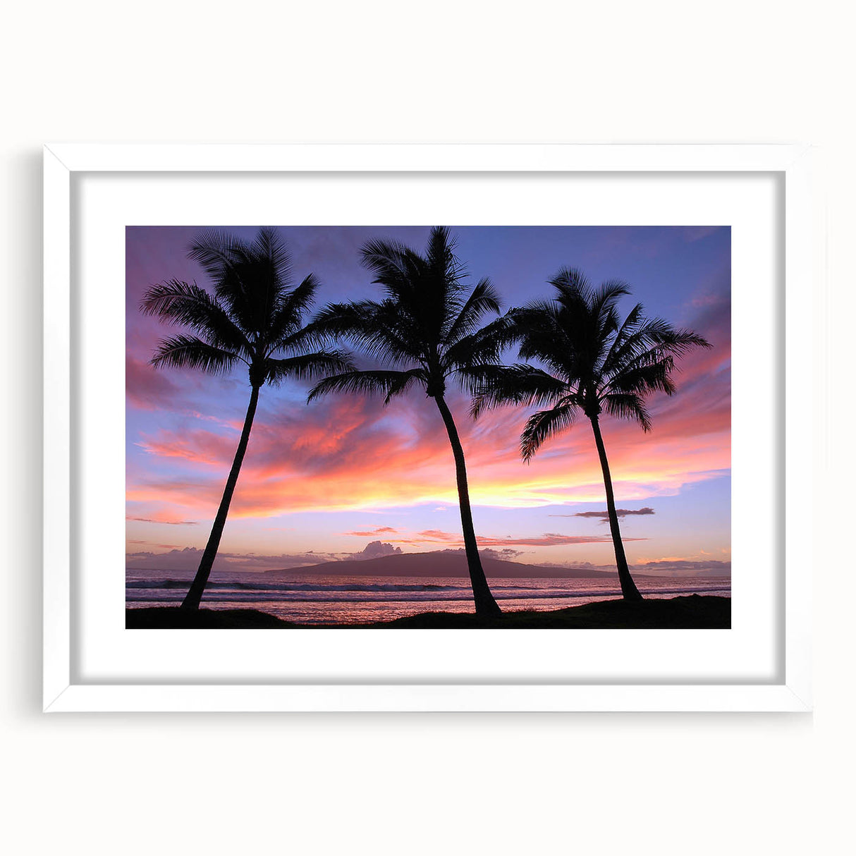 Abstract art print of a serene Maui landscape in soft blue and green tones, framed in white, ideal for dining room decor.