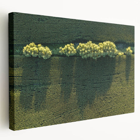 Side view of a stretched canvas depicting a serene Iowa landscape, in soft green and blue tones.