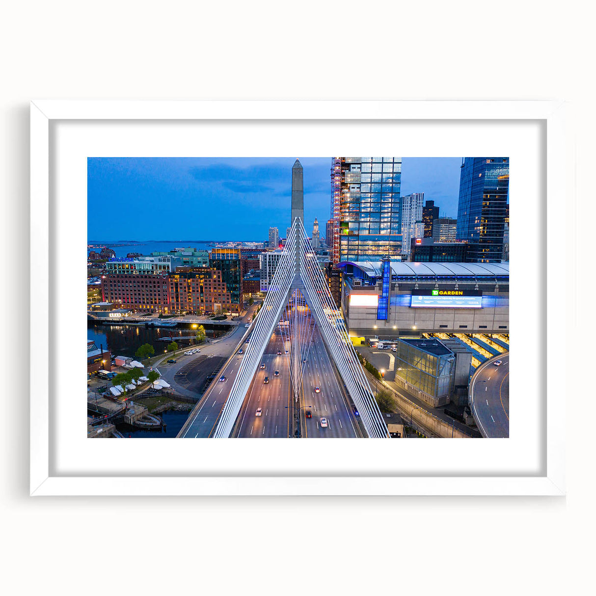 Abstract art print of Boston skyline in muted gray and blue tones on a framed white mat, suitable for dining room decor.
