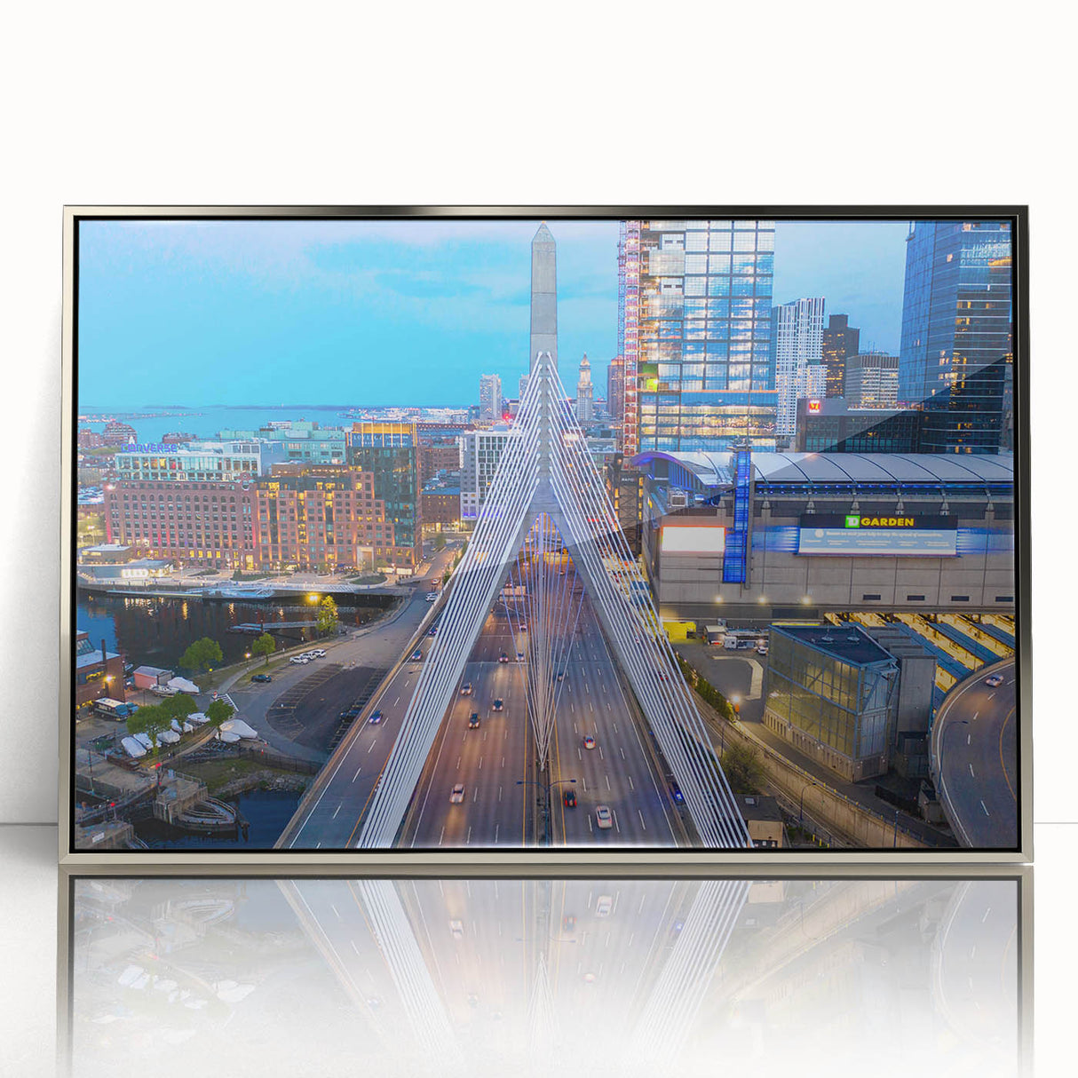 Mid-century modernist art of Boston skyline in silver acrylic frame, featuring muted blue and gray tones.