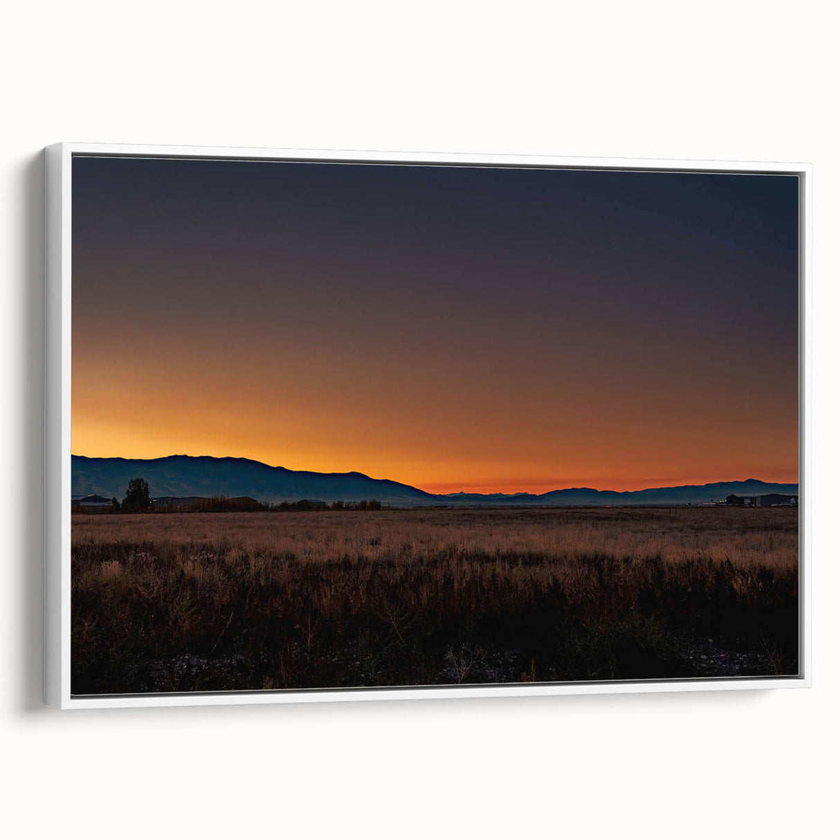 Vintage poster art of Montana scenery on framed canvas, featuring colorful art with black accents.