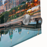 Large abstract wall art featuring vibrant hues and geometric shapes on acrylic glass, ideal for dining room ambiance.