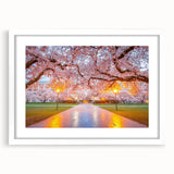 Abstract art print of Seattle skyline in muted gray and blue tones, framed with a white mat.
