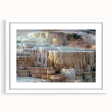 Abstract art print of Yellowstone scenery in muted earth tones on a framed white mat, ideal for dining room decor.