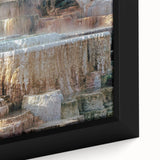 Close-up of a textured black wall art depicting Yellowstone scenery on a framed canvas, ideal for living room decor.