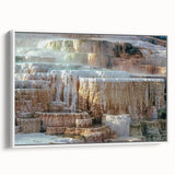 Vintage poster art of Yellowstone scenery on framed canvas, featuring vibrant colors and black borders.