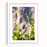 Abstract art print featuring swirling spring colors in green and pink on a white framed canvas, ideal for dining room decor.