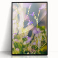 Large abstract wall art depicting spring themes in vibrant greens and pastels, framed in black acrylic.