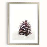 Textured art depicting abstract winter scene in muted blue and white tones on a framed silver mat.