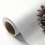 Art deco poster of a winter scene on rolled canvas, featuring cool blue and white tones, ideal for nursery wall art.