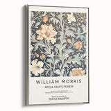 Framed canvas artwork showcasing vibrant abstract floral designs in hues of blue and gold, with a sleek silver frame enhancing its elegance and charm. Ideal for modern home decor.