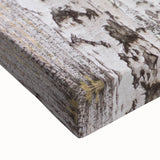 Close-up of a vibrant abstract floral canvas artwork showcasing intricate brush strokes in shades of blue, pink, and yellow, perfect for modern home decor.