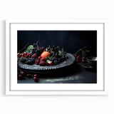 Abstract art print featuring assorted fruits in bright colors on a white mat and frame, suitable for dining room decor.