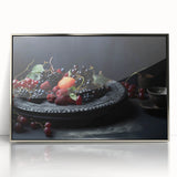Mid-century modernist art featuring assorted fruits in vibrant colors on a silver-framed acrylic print.