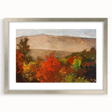 Textured abstract art print in warm autumn hues on a silver-framed canvas, ideal for bedroom art.
