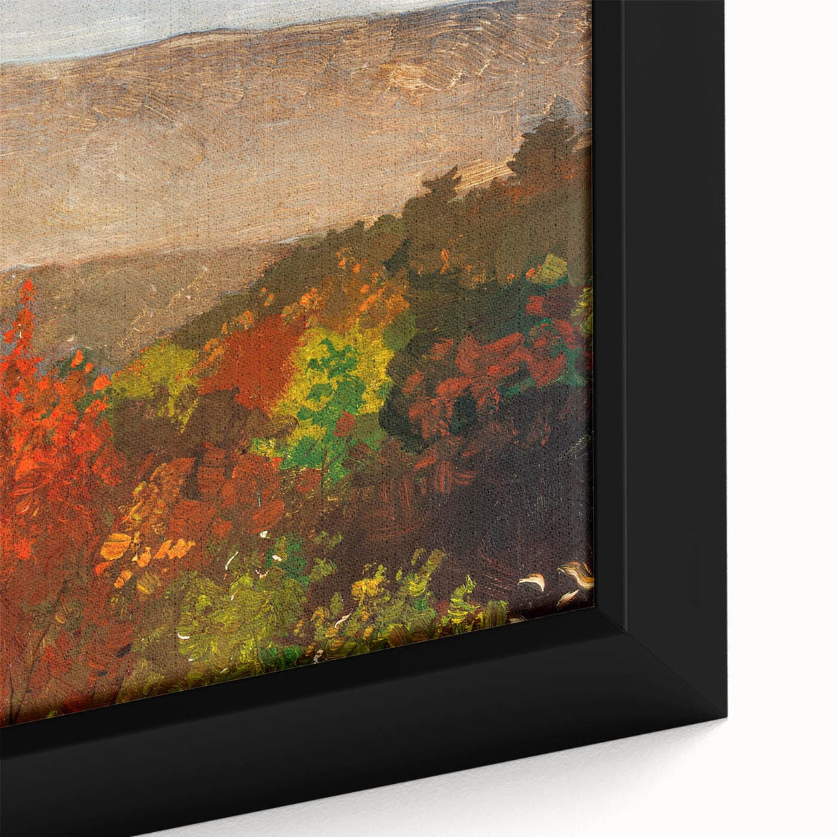 Close-up of a framed canvas featuring a textured, abstract design with black and colorful elements.