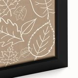 Close-up of a framed canvas depicting a textured fall scene in black with vibrant, colorful accents.