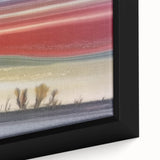 Abstract landscape framed canvas artwork showcasing vibrant hues of blue and orange, with a textured surface and intricate details, perfect for modern home decor.