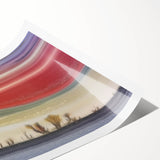 Abstract landscape print showcasing vibrant hues of blue, green, and gold, rolled and packaged in a protective tube, perfect for modern home decor.