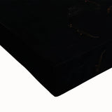 Close-up of a large art piece depicting fruits in black and white, printed on stretched canvas.