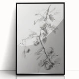 Framed acrylic artwork showcasing an abstract floral design in vibrant colors, featuring a sleek black frame, ideal for modern home decor.