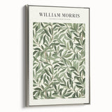 Framed canvas artwork showcasing an abstract floral design with vibrant colors and a chic silver frame, ideal for modern home decor and artistic spaces.