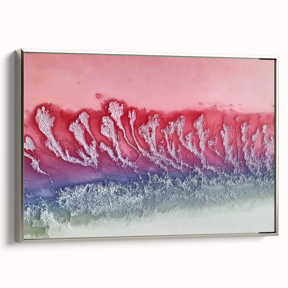 Framed canvas art depicting an abstract landscape with vibrant colors and textured brush strokes, showcased in a sleek silver frame, ideal for modern decor.