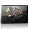 Large abstract wall art featuring assorted fruits in vibrant colors on a black acrylic framed print.