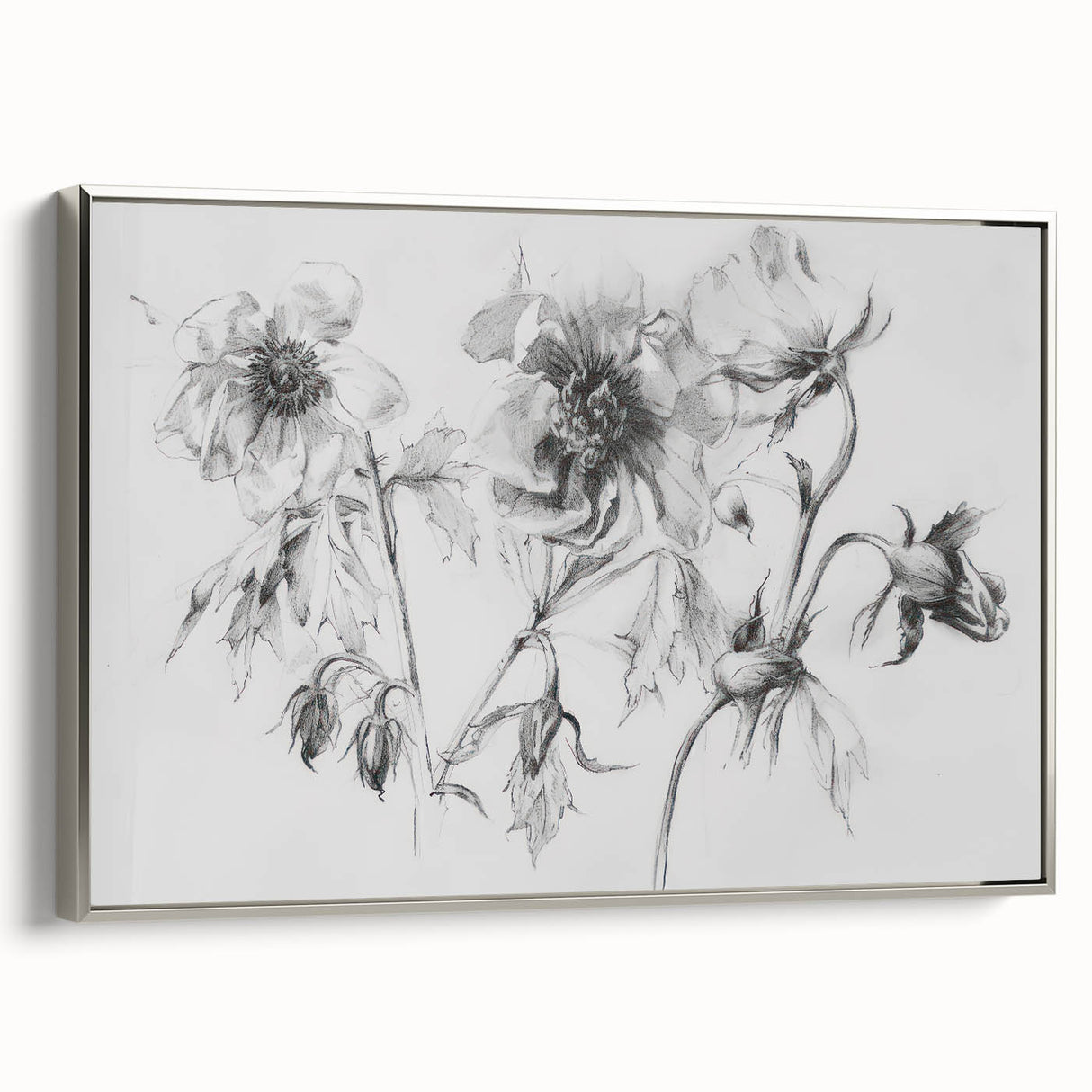 Framed canvas artwork showcasing vibrant abstract floral designs in shades of blue and pink, with a sleek silver frame enhancing its contemporary aesthetic.