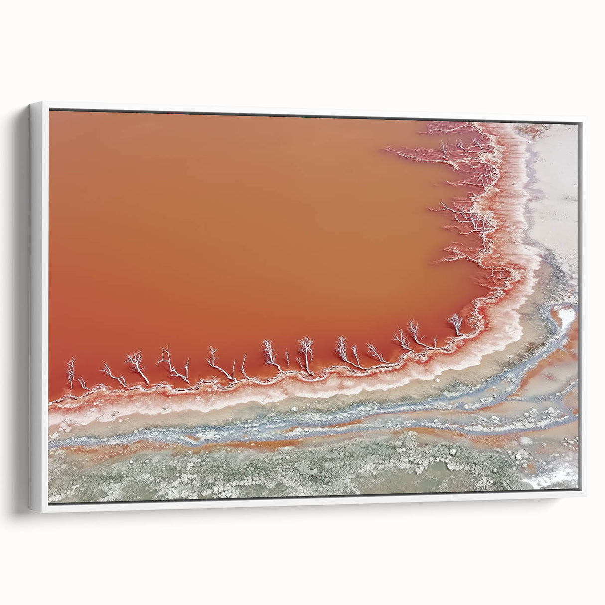Framed abstract landscape canvas art showcasing soft earth tones and fluid shapes, elegantly displayed in a white frame, ideal for modern home decor.