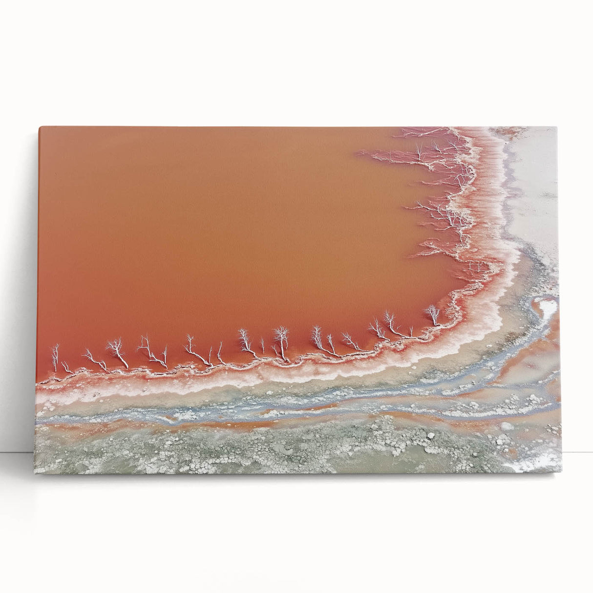 Abstract landscape canvas art showcasing vibrant hues of blue and green, ideal for modern home decor. The artwork is elegantly stretched and leaning against a neutral wall, enhancing any interior space with a serene, nature-inspired aesthetic.