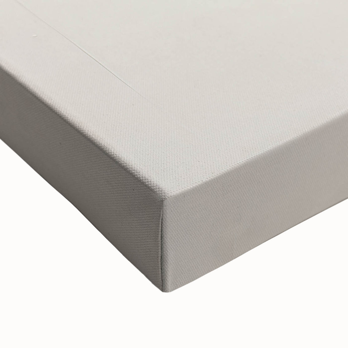 Close-up of a stretched canvas showcasing an abstract minimalist wall art design, featuring soft pastel colors and fluid shapes, perfect for modern home decor.
