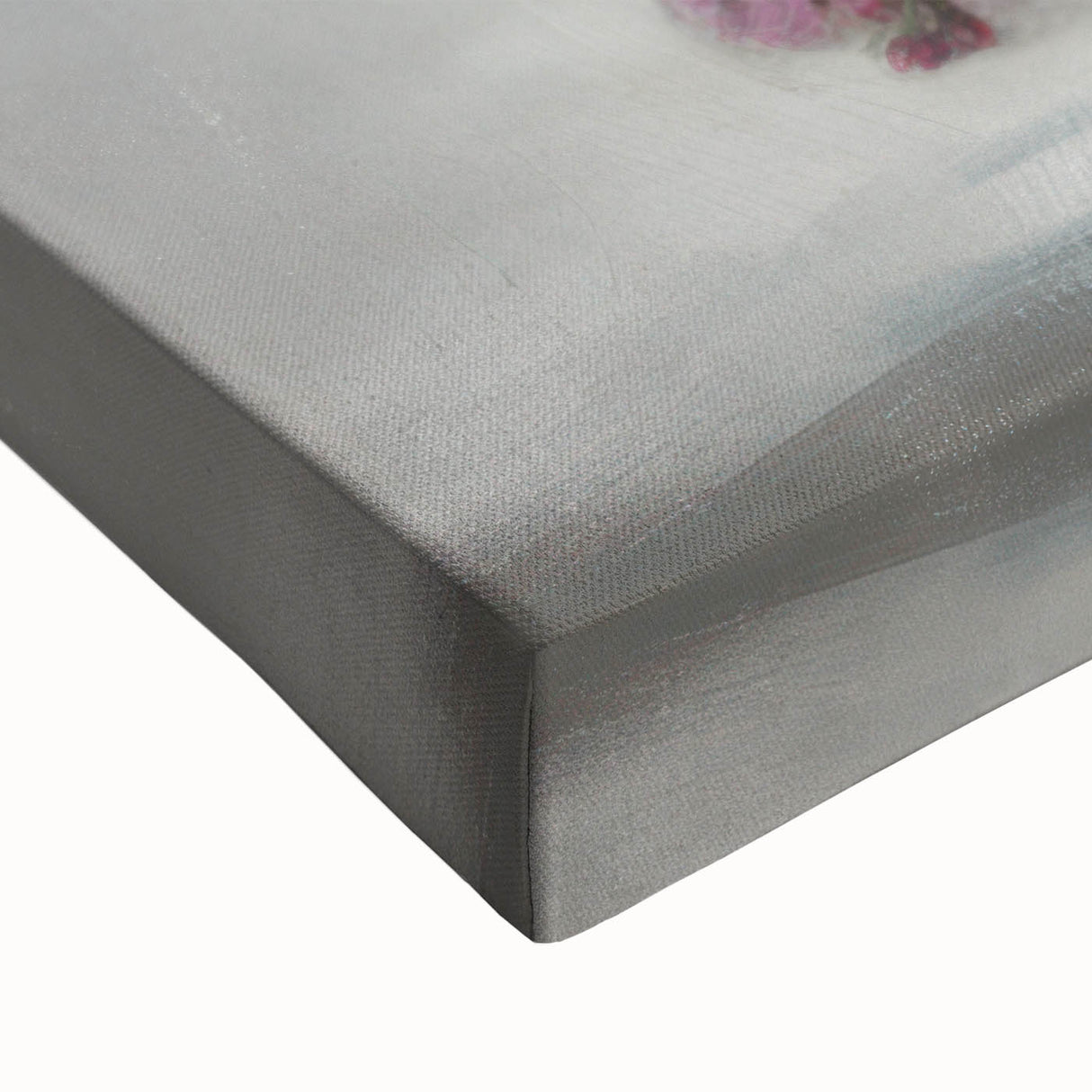 Close-up of a vibrant abstract floral stretched canvas artwork, showcasing rich colors like deep blues and bright pinks, perfect for home decor enhancement.
