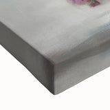 Close-up of a vibrant abstract floral stretched canvas artwork, showcasing rich colors like deep blues and bright pinks, perfect for home decor enhancement.